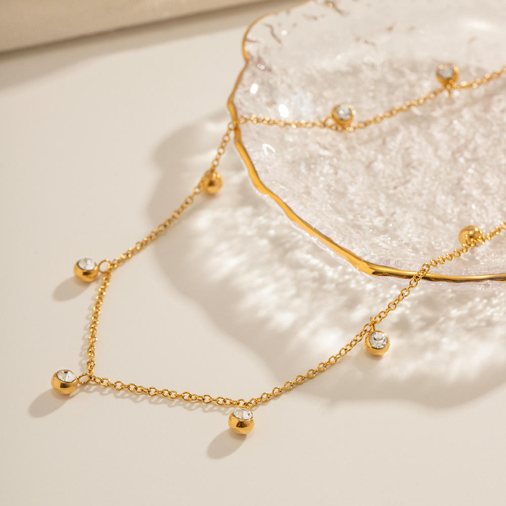 Elegant Gold Dangling Necklace with Crystal Charms || DV01